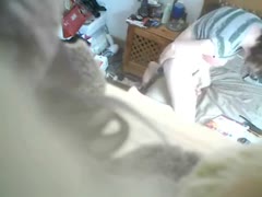 On a concealed camera, my white woman is experimenting with two vibrators.